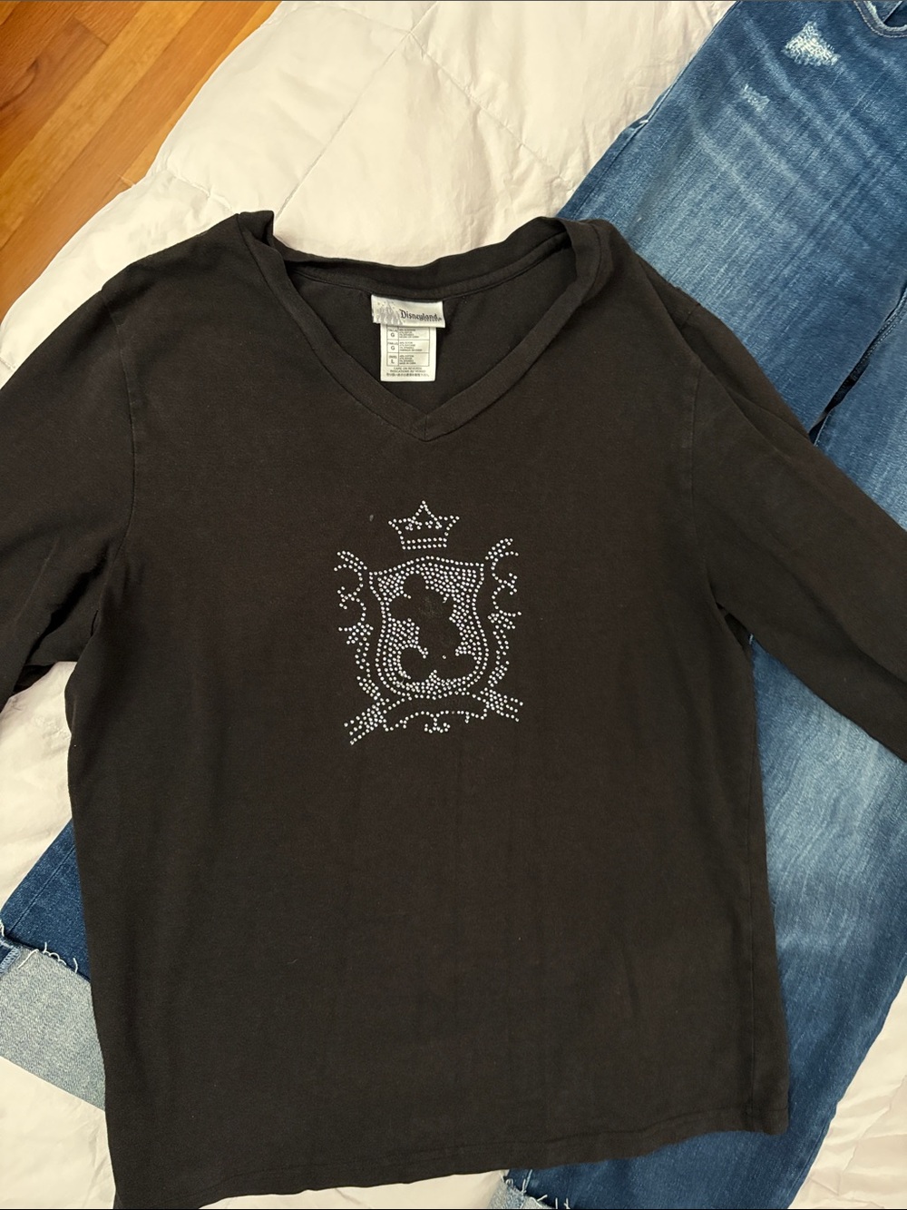 Disney Black Long Sleeve V‑Neck Top with Rhinestone Crest